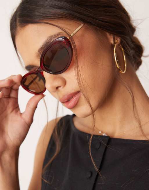 Jeepers Peepers - Occhiali da sole ovali color rosso scuro