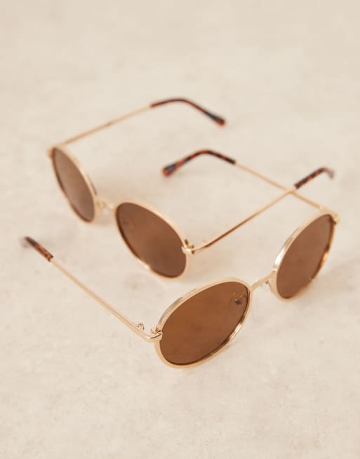 Jeepers Peepers – Okrągłe metalowe okulary przeciwsłoneczne w złotym kolorze z brązowymi soczewkami, 2 z 3
