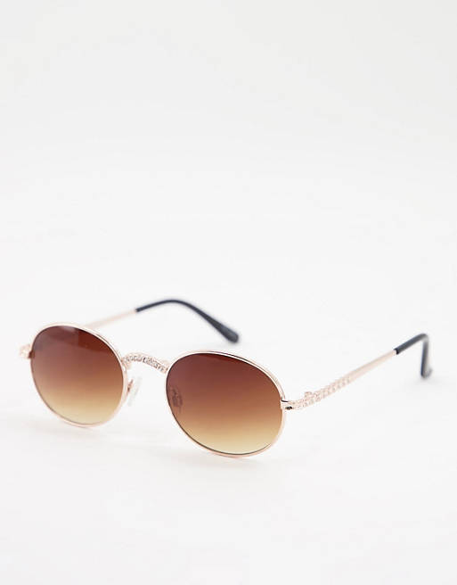 Jeepers Peepers womens round sunglasses with nose and arm detail in gold