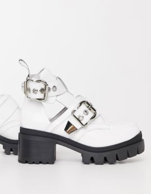 white boots with buckles