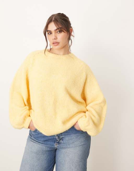 Jersey amarillo pastel extragrande con cuello redondo de ARRANGE Curve