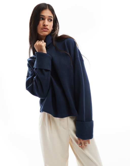 Jersey azul marino con cuello vuelto y detalle en los puños de punto muy suave de ASOS DESIGN