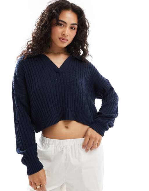 Jersey azul marino de manga larga con cuello tipo polo de Hollister