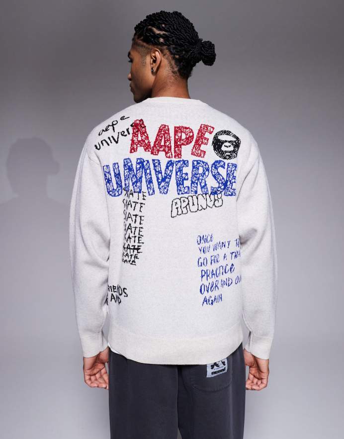 Aape By A Bathing Ape® Jersey blanco hueso con estampado posicional de garabatos de punto de