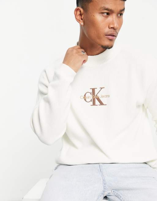 Jersey color marfil holgado con cuello alto y logo de monograma de punto de Calvin Klein Jeans