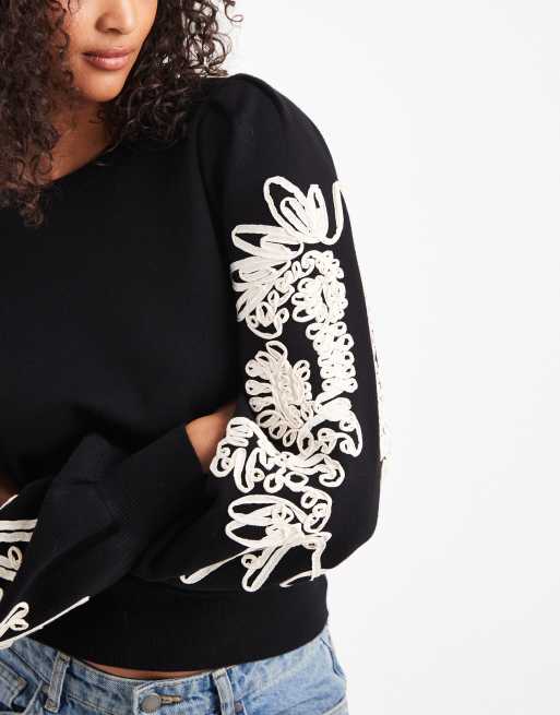 Jersey negro con mangas voluminosas y detalle de aplicaciones florales de Object, 3 de 4