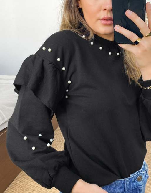 Sueter negro con perlas hot sale