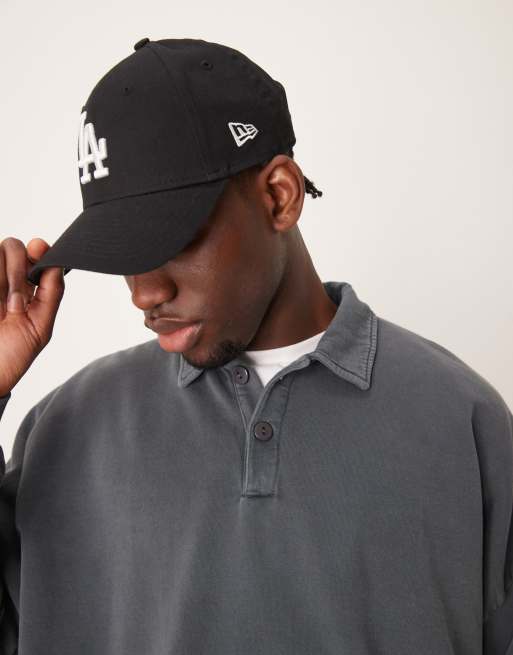 Jersey negro lavado extragrande con cuello tipo polo y hombros caídos de ASOS DESIGN, 2 de 4