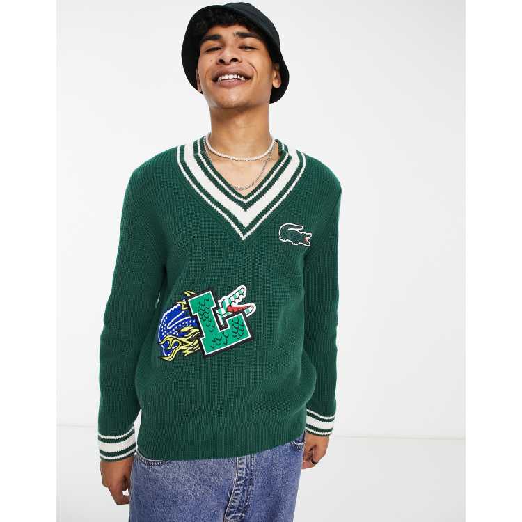 Jersey verde holgado con cuello de pico y detalle de rayas Holiday de Lacoste