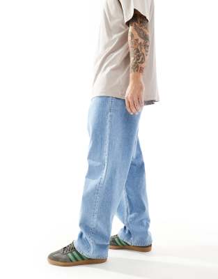 JJ Rebel baggy fit jeans in mid wash blue 