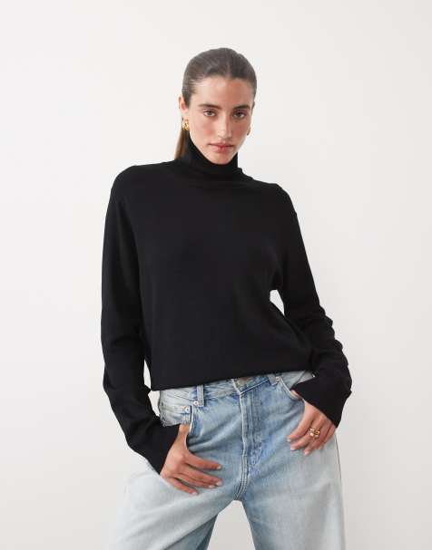 JJ Rebel knitted roll neck top in black - view 1
