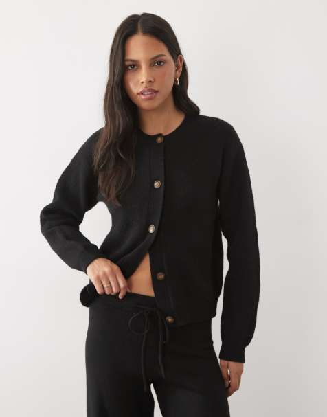 JJ Rebel long sleeved knitted cardigan in black - view 1