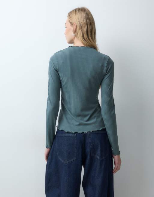 JJ Rebel long sleeved lettuce hem top in green, 5 of 5