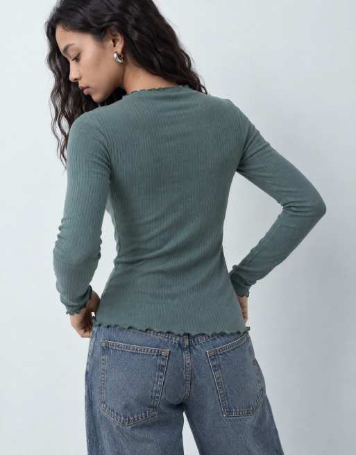 JJ Rebel long sleeved lettuce hem top in green, 9 of 10
