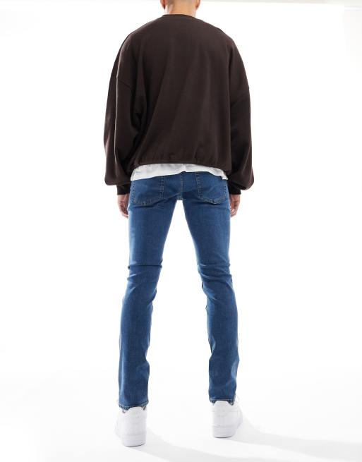 JJ Rebel - Luke - Slim-fit jeans in middenblauwe wassing, 2 van 5