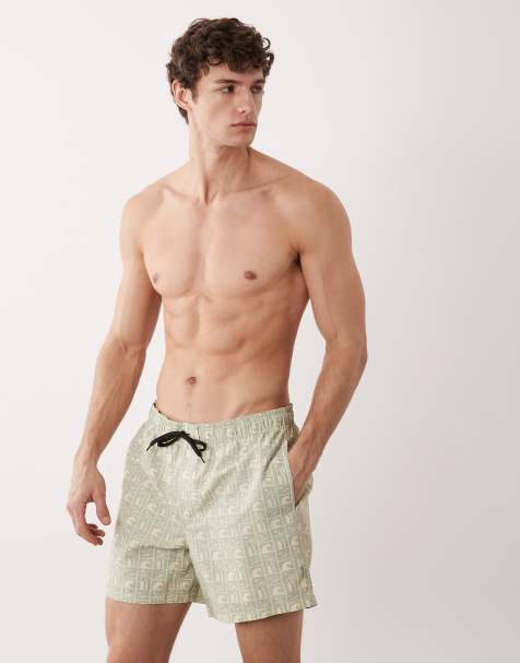 JJ Rebel swim shorts with surf print in green - view 1