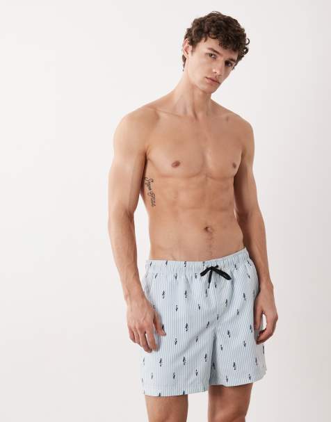 JJ Rebels stripe swim shorts with fish print in blue - view 1