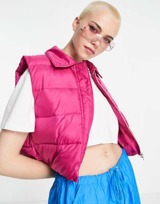 cropped padded vest in bright pink