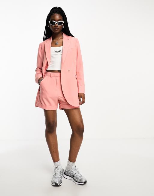 Coral shorts and store blazer