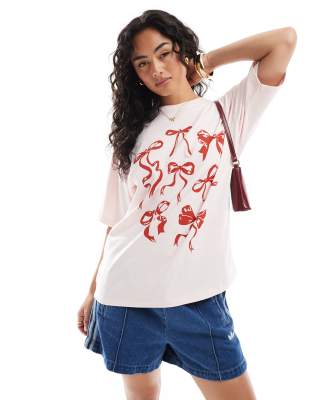 JJXX - Oversize-T-Shirt in Rosa mit roten Schleifen