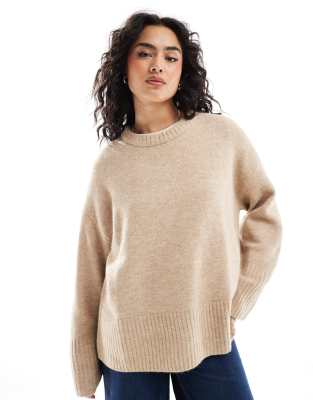 oversized knit sweater in cream-White