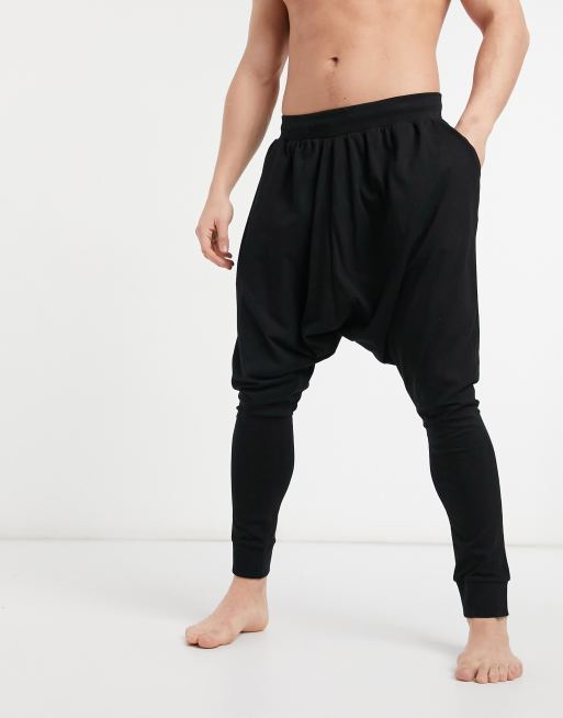Jogger de estar por casa negro de tiro caído de ASOS DESIGN