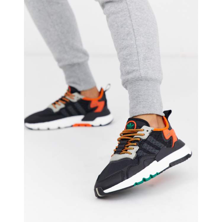 Contrapartida civilización luego Jogger en negro y naranja Nite de adidas Originals | ASOS