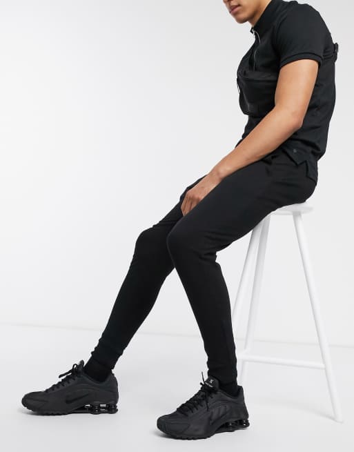 Joggers ajustados con diseño ligero en negro de ASOS DESIGN, 4 de 4