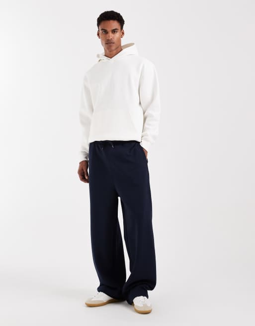 Joggers azul marino básicos de corte ancho de ASOS DESIGN, 2 de 5