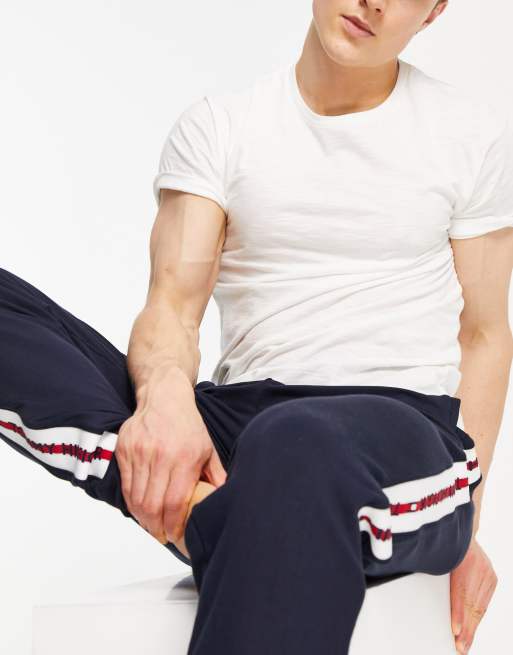 Joggers azul marino con banda del logo en el lateral de Tommy Hilfiger, 3 de 4