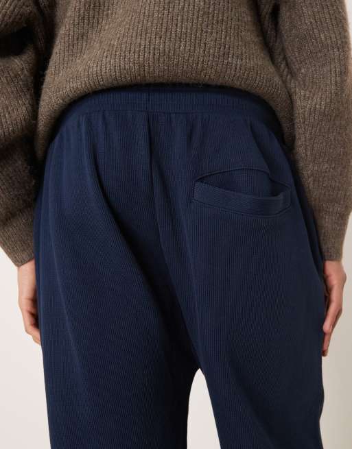 Joggers azul marino de corte tapered con bajos ajustados de ASOS DESIGN, 5 de 5