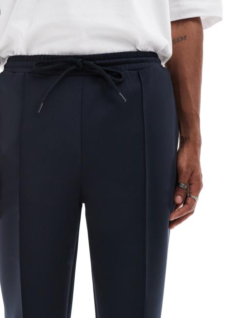 Joggers azul marino de corte tapered de tejido efecto neopreno de ASOS DESIGN, 5 de 5