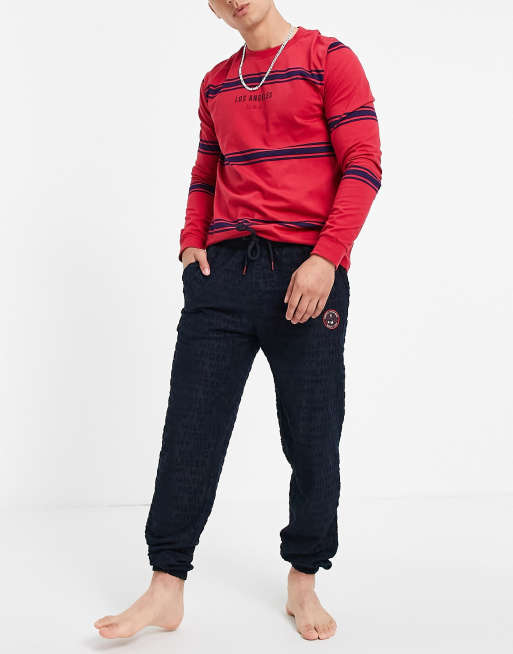 Joggers azul marino de estar por casa con logo de tenis pequeño de rizo tipo toalla de Tommy Hilfiger