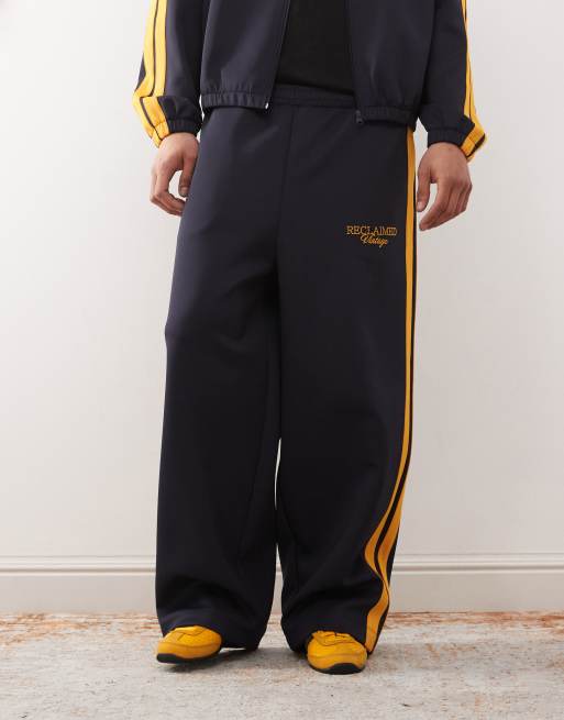 Joggers azul marino de pernera ancha con raya lateral de Reclaimed Vintage (parte de un conjunto), 1 de 5
