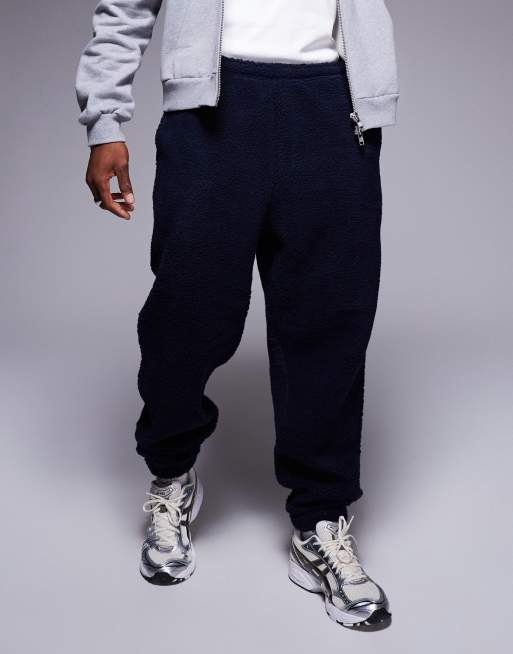 Joggers azul marino extragrandes de borreguito de ASOS DESIGN