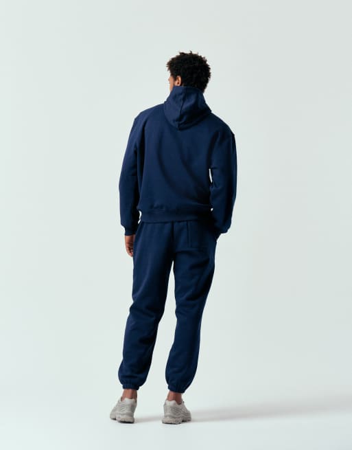 Joggers azul marino holgados con diseño estampado de ASOS DESIGN (parte de un conjunto), 3 de 5