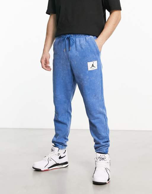 Joggers azules con acabado lavado de felpa de Jordan