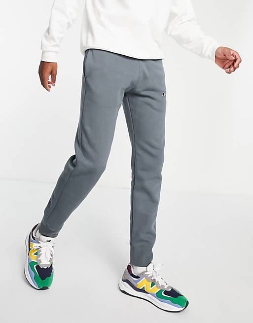 Hombre Pantalones y mallas | Joggers azules con logo pequeño de Champion - KK51867