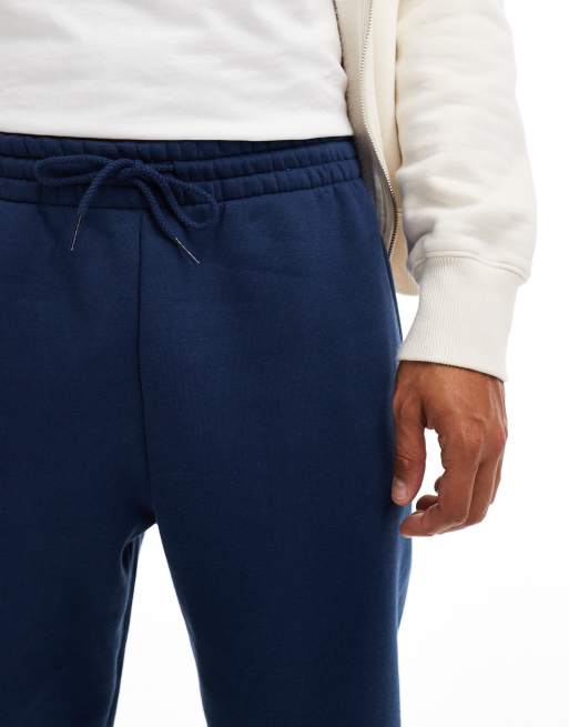 Joggers azules de felpa Sport Essentials de New Balance, 4 de 5