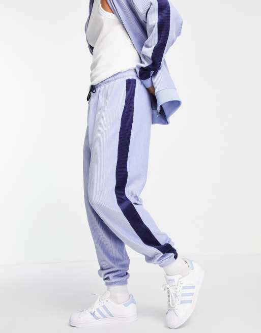 Joggers azules extragrandes con banda lateral de canalé de velour de ASOS DESIGN (parte de un conjunto)