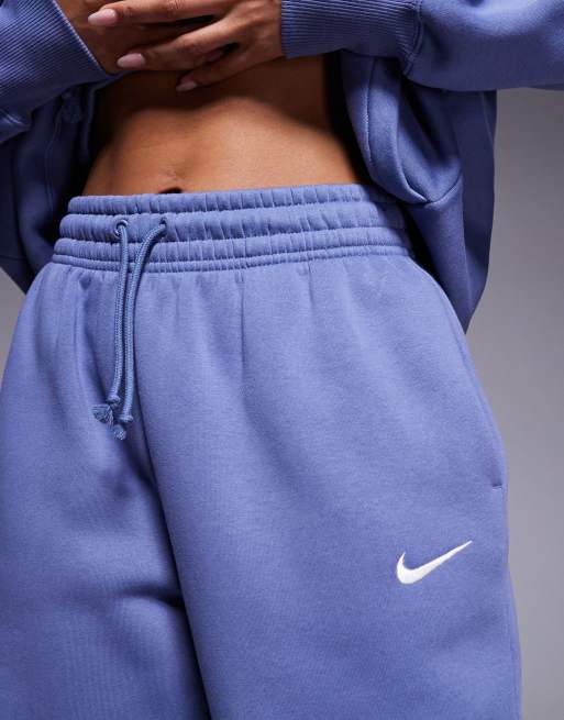 Joggers azules extragrandes de talle alto con bajos ajustados Phoenix Fleece de Nike, 2 de 5