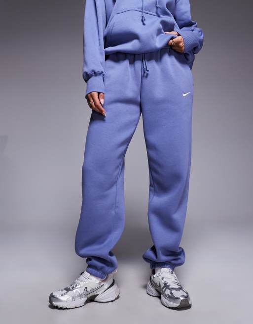 Joggers azules extragrandes de talle alto con bajos ajustados Phoenix Fleece de Nike, 3 de 5