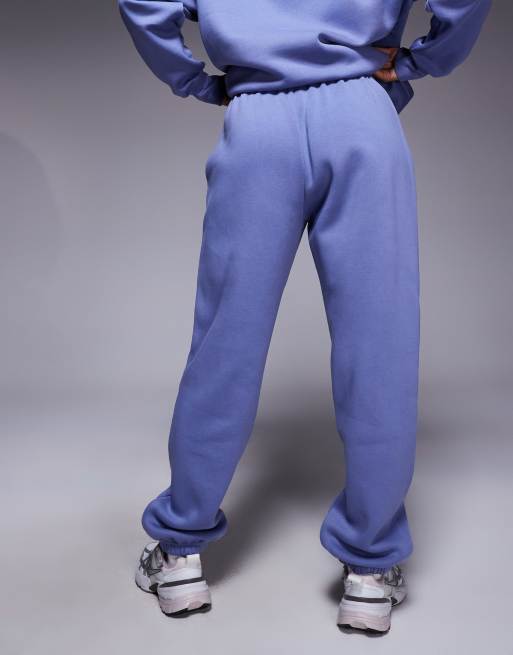 Joggers azules extragrandes de talle alto con bajos ajustados Phoenix Fleece de Nike, 5 de 5