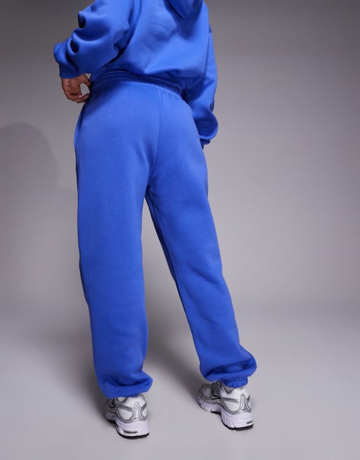 Joggers azules extragrandes de talle alto con bajos ajustados Phoenix Fleece de Nike, 4 de 5