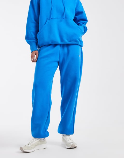 Joggers azules extragrandes de talle alto con bajos ajustados Phoenix Fleece de Nike, 2 de 5