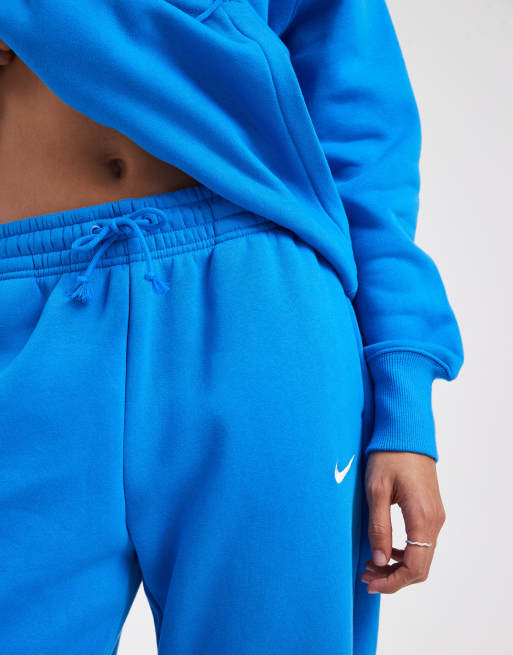 Joggers azules extragrandes de talle alto con bajos ajustados Phoenix Fleece de Nike, 3 de 5