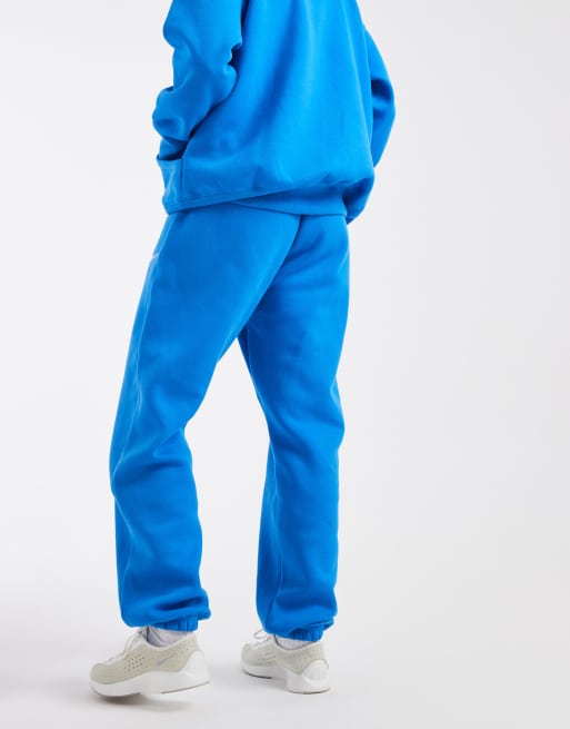 Joggers azules extragrandes de talle alto con bajos ajustados Phoenix Fleece de Nike, 5 de 5