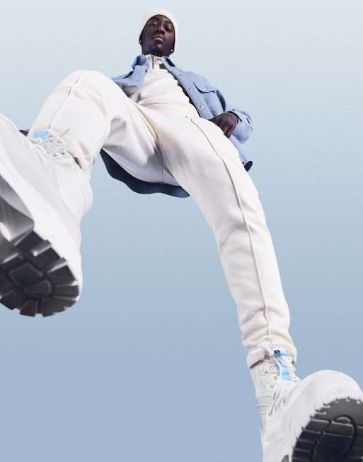 Joggers beis <em>tapered</em> con jaretas de ASOS DESIGN (parte de un conjunto)