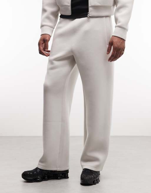 Joggers blanco hueso de pernera ancha de tejido efecto neopreno de Weekday (parte de un conjunto), 2 de 5