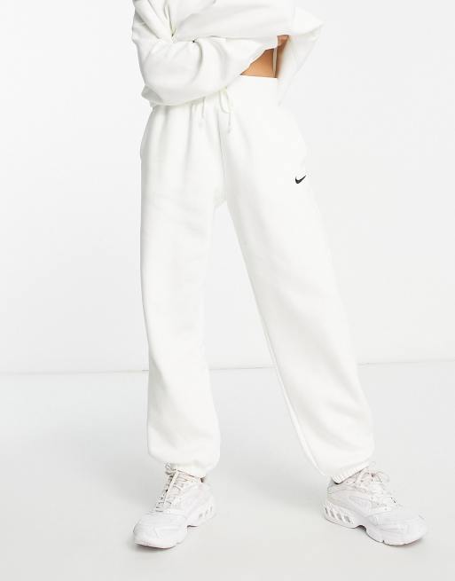 Joggers blancos extragrandes de talle alto con logo de Nike |